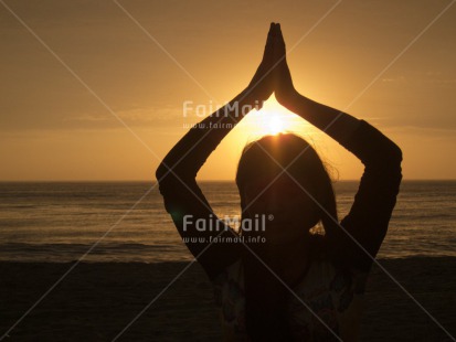 Fair Trade Photo Activity, Beach, Clouds, Colour image, Evening, Horizontal, Meditating, One girl, Outdoor, People, Peru, Sea, Sky, South America, Spirituality, Sunset, Yoga