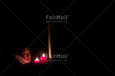 Fair Trade Photo Candle, Christmas, Colour image, Emotions, Flame, Hope, Horizontal, Latin, Loneliness, Night, One girl, Outdoor, People, Peru, Portrait headshot, Red, Sadness, South America, Thinking of you, Waiting