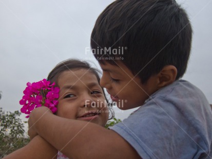 Fair Trade Photo 5 -10 years, Activity, Brother, Care, Closeup, Colour image, Cute, Family, Flower, Giving, Horizontal, Latin, People, Peru, Sister, South America