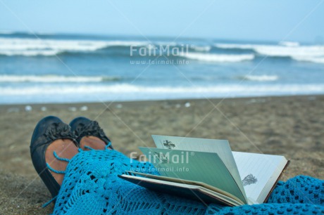 Fair Trade Photo Activity, Beach, Book, Closeup, Colour image, Holiday, One woman, People, Peru, Reading, Sand, Sea, Sitting, South America, Summer