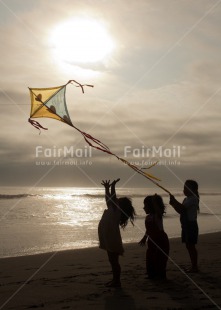 Fair Trade Photo 5 -10 years, Activity, Beach, Colour image, Emotions, Evening, Freedom, Group of girls, Happiness, Kite, Outdoor, People, Peru, Playing, Sea, Sky, South America, Summer, Sun
