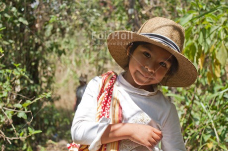 Fair Trade Photo Activity, Agriculture, Colour image, Day, Farmer, Harvest, Hat, Looking at camera, One girl, Outdoor, People, Peru, Portrait halfbody, Smiling, Sombrero, South America, Working