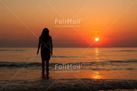 Fair Trade Photo Beach, Colour image, Emotions, Evening, Holiday, Horizontal, Loneliness, Netherlands, One girl, Outdoor, People, Peru, Scenic, Sea, Silhouette, South America, Sunset, Travel