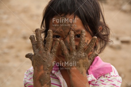 Fair Trade Photo Activity, Adobe brick, Colour image, Construction, Cute, Horizontal, One girl, People, Peru, Playing, South America