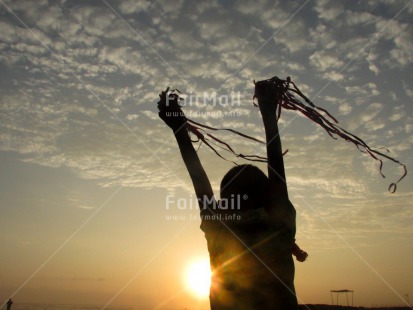 Fair Trade Photo Colour image, Horizontal, One child, Party, Peru, Silhouette, Sky, South America, Sunset