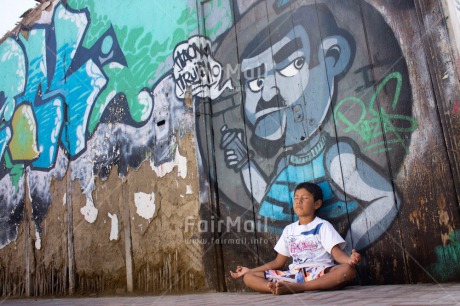 Fair Trade Photo Casual clothing, Clothing, Colour image, Graffity, Health, Horizontal, One boy, Outdoor, Peace, People, Peru, South America, Urban, Wellness, Yoga