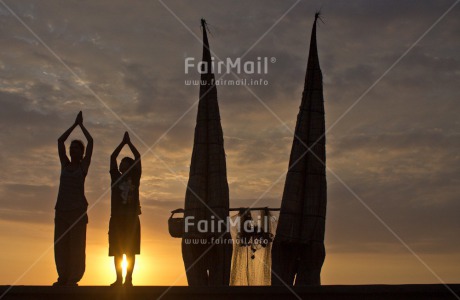 Fair Trade Photo Colour image, Ethnic-folklore, Evening, Fishing boat, Horizontal, Huanchaco, Peru, Shooting style, Silhouette, South America, Sunset, Two people