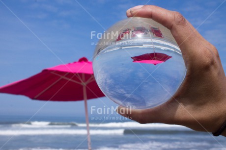 Fair Trade Photo Artistique, Beach, Colour image, Hand, Horizontal, Peru, Reflection, Sky, South America, Summer, Transparent, Umbrella