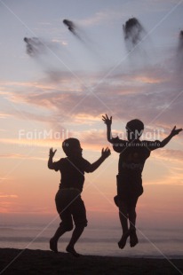 Fair Trade Photo Activity, Colour image, Emotions, Friendship, Happiness, Jumping, Peru, Playing, Shooting style, Silhouette, South America, Sunset, Vertical