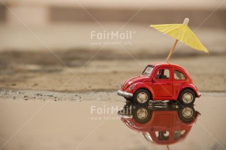 Fair Trade Photo Activity, Car, Colour image, Day, Holiday, Horizontal, Outdoor, Peru, Rain, Red, Seasons, South America, Summer, Transport, Travel, Travelling, Umbrella, Water