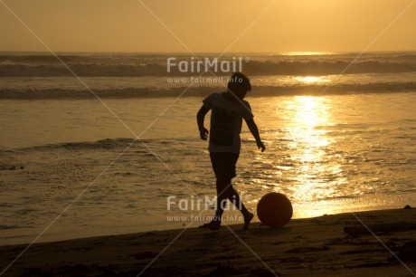 Fair Trade Photo Activity, Ball, Beach, Boy, Child, Colour image, Evening, Horizontal, Ocean, Outdoor, People, Peru, Playing, Sea, Soccer, South America, Sunset