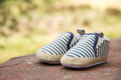 Fair Trade Photo Baby, Birth, Blue, Boy, Colour image, Day, Girl, Horizontal, Nature, New baby, Outdoor, People, Peru, Shoe, South America, Wood