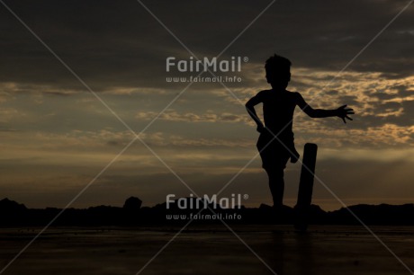 Fair Trade Photo 5 -10 years, Activity, Child, Clouds, Colour image, Evening, Horizontal, Peru, Playing, Shooting style, Silhouette, Sky, South America, Sunset, Wheel