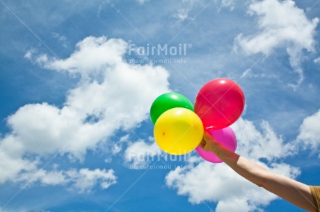 Fair Trade Photo Activity, Balloon, Birthday, Blue, Celebrating, Clouds, Colour image, Colourful, Friendship, Hand, Holding, Multi-coloured, Peru, Sky, South America