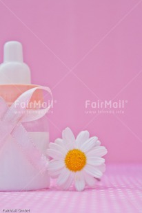 Fair Trade Photo Biberon, Birth, Colour image, Daisy, Flower, Girl, New baby, People, Peru, Pink, South America, Vertical