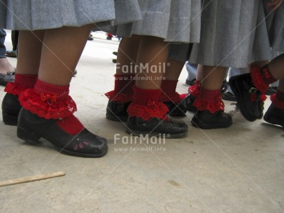 Fair Trade Photo Activity, Ceremony, Clothing, Colour image, Education, Ethnic-folklore, Friendship, Grey, Group of girls, Horizontal, Latin, Outdoor, People, Peru, Portrait halfbody, Red, School, Shoe, South America, Together, Uniform, Walking