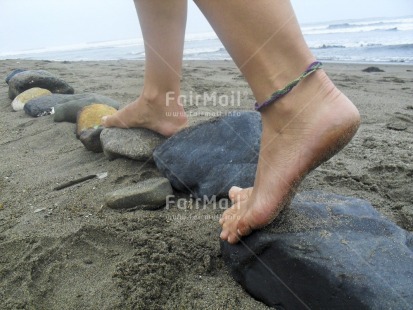 Fair Trade Photo Activity, Beach, Closeup, Colour image, Foot, Horizontal, People, Peru, Sand, Sea, Seasons, South America, Stone, Summer, Walking, Water