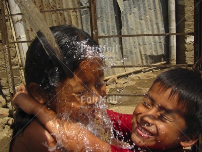 Fair Trade Photo Activity, Brother, Colour image, Cute, Dailylife, Day, Family, Friendship, Health, Horizontal, House, Outdoor, People, Peru, Sanitation, Showering, Sister, Smile, Smiling, South America, Together, Two children, Washing, Water