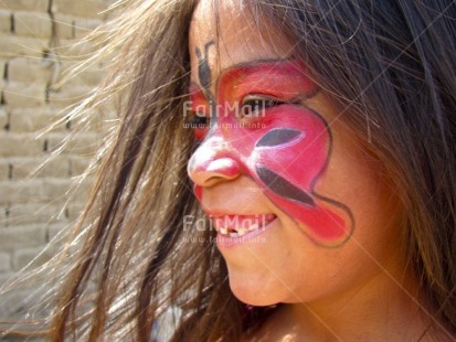 Fair Trade Photo 5-10 years, Activity, Butterfly, Colour image, Day, Decoration, Ethnic-folklore, Horizontal, Looking away, One child, One girl, Outdoor, People, Peru, Portrait headshot, Smiling, South America