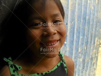 Fair Trade Photo 5-10 years, Activity, Colour image, Day, Horizontal, Looking at camera, One child, One girl, Outdoor, People, Peru, Portrait headshot, Smiling, South America, Street, Streetlife