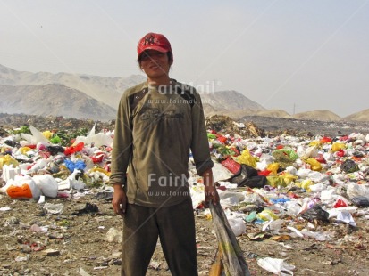 Fair Trade Photo 20-25 years, Activity, Casual clothing, Child labour, Clothing, Colour image, Day, Garbage, Health, Horizontal, Hygiene, Looking at camera, One boy, Outdoor, People, Peru, Portrait fullbody, Recycle, Safety, Sanitation, South America