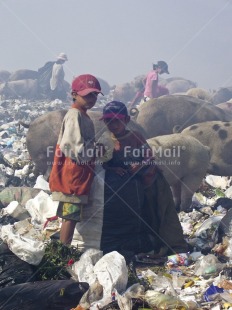 Fair Trade Photo Activity, Child labour, Colour image, Day, Environment, Garbage, Garbage belt, Health, Looking at camera, Outdoor, People, Peru, Portrait fullbody, Recycle, Sanitation, South America, Sustainability, Two boys, Values, Vertical, Working