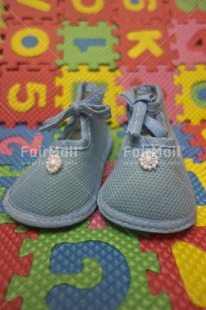 Fair Trade Photo Birth, Colour image, Indoor, New baby, Peru, Shoe, South America, Studio, Vertical