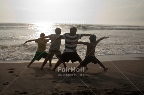 Fair Trade Photo 10-15 years, Activity, Beach, Casual clothing, Clothing, Colour image, Cooperation, Friendship, Group of boys, Health, Horizontal, Latin, Outdoor, People, Peru, Sea, South America, Sport, Together, Water, Yoga