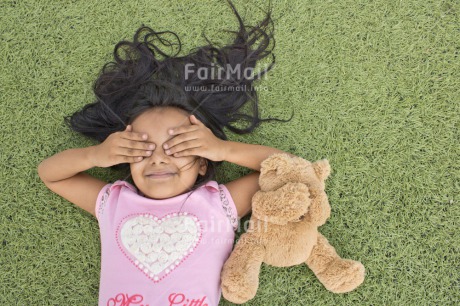 Fair Trade Photo Activity, Animals, Bear, Child, Colour image, Emotions, Felicidad sencilla, Girl, Hand, Happiness, Happy, Horizontal, New beginning, People, Peru, Play, Playground, Playing, Smiling, South America, Teddybear