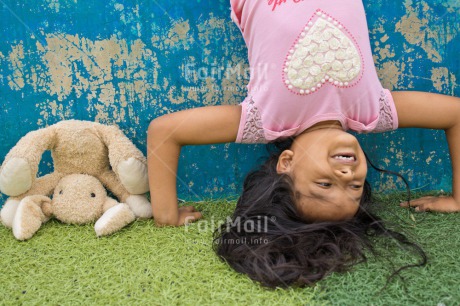 Fair Trade Photo Activity, Animals, Bear, Child, Colour image, Emotions, Felicidad sencilla, Girl, Happiness, Happy, Horizontal, New beginning, People, Peru, Play, Playground, Playing, Smiling, South America, Teddybear