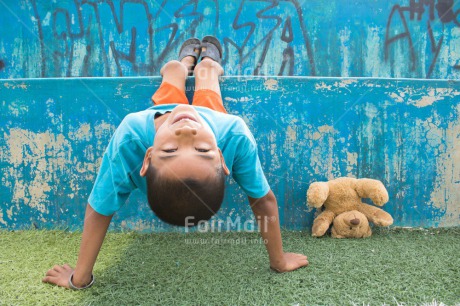 Fair Trade Photo Activity, Blue, Child, Colour, Colour image, Emotions, Happiness, Horizontal, Object, Peluche, People, Place, Play, Playing, South America