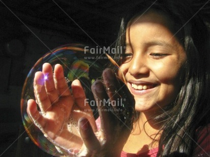 Fair Trade Photo 5-10 years, Artistique, Balloon, Black, Care, Colour image, Day, Earth, Hope, Horizontal, One girl, Outdoor, People, Peru, Pink, Portrait headshot, Reflection, Responsibility, Soapbubble, South America, Transparent, Values