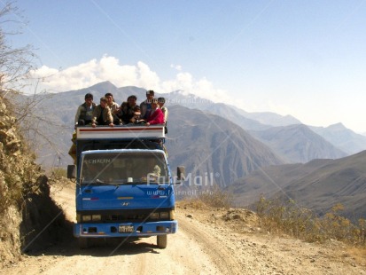 Fair Trade Photo Andes, Colour image, Day, Good trip, Group of People, Horizontal, Mountain, Multi-coloured, Outdoor, People, Peru, Portrait halfbody, Road, Rural, Scenic, South America, Transport, Travel, Truck