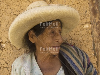 Fair Trade Photo 55-60 years, Activity, Clothing, Colour image, Day, Hat, Horizontal, Looking away, Old age, One woman, Outdoor, People, Peru, Portrait headshot, South America, Street, Streetlife