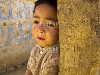 Fair Trade Photo 5-10 years, Activity, Casual clothing, Clothing, Colour image, Day, Horizontal, Indoor, Looking away, One boy, People, Peru, Portrait halfbody, South America, Street, Streetlife