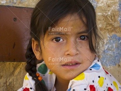 Fair Trade Photo 5-10 years, Activity, Casual clothing, Clothing, Colour image, Day, Education, Horizontal, Indoor, Latin, Looking at camera, One girl, People, Peru, Portrait headshot, School, South America