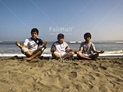 Fair Trade Photo 10-15 years, Activity, Beach, Casual clothing, Clothing, Colour image, Day, Friendship, Group of boys, Horizontal, Latin, Meditating, Outdoor, People, Peru, Sand, Sea, Seasons, South America, Summer, Together, Yoga