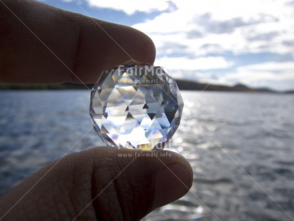 Fair Trade Photo Care, Clouds, Colour image, Diamond, Hand, Horizontal, Light, Peru, Reflection, Sky, South America, Spirituality, Sun, Water, Wellness