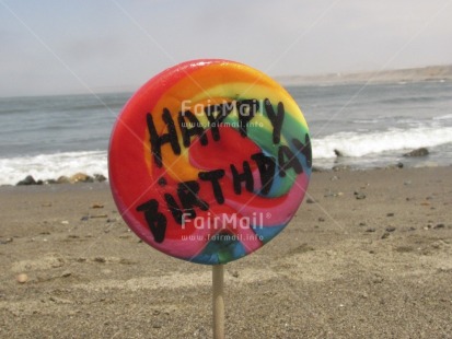 Fair Trade Photo Beach, Birthday, Closeup, Colour image, Day, Horizontal, Letter, Lollypop, Multi-coloured, Outdoor, Peru, Sand, Sea, South America
