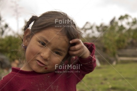 Fair Trade Photo 0-5 years, Activity, Casual clothing, Clothing, Colour image, Day, Garden, Horizontal, Looking at camera, One girl, Outdoor, People, Peru, Portrait headshot, Rural, Smiling, South America