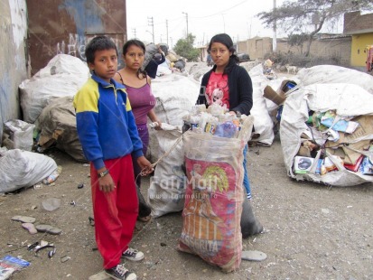 Fair Trade Photo Activity, Casual clothing, Child labour, Clothing, Colour image, Cooperation, Day, Garbage, Garbage belt, Health, Horizontal, Hygiene, Looking at camera, Outdoor, People, Peru, Portrait fullbody, Recycle, Safety, Sanitation, South America