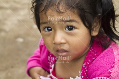 Fair Trade Photo 0-5 years, Activity, Colour image, Cute, Day, Horizontal, Looking at camera, One child, One girl, Outdoor, People, Peru, Pink, Portrait headshot, South America