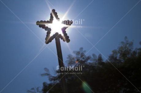 Fair Trade Photo Backlit, Christianity, Christmas, Colour image, Evening, Horizontal, Light, New Year, Outdoor, Peru, Religion, Sky, South America, Spirituality, Star, Sun, Tree