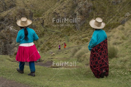 Fair Trade Photo Activity, Clothing, Ethnic-folklore, Friendship, Green, Horizontal, Looking away, Mountain, People, Portrait fullbody, Rural, Scenic, Traditional clothing, Travel, Two women, Walking