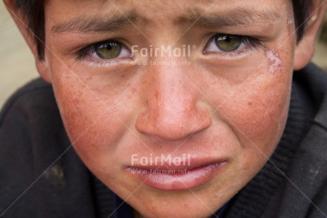 Fair Trade Photo 5 -10 years, Closeup, Colour image, Day, Emotions, Horizontal, Latin, One boy, Outdoor, People, Peru, Portrait headshot, Sadness, South America