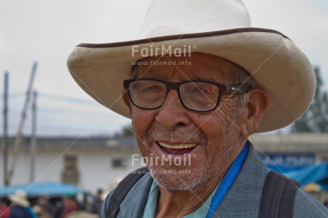 Fair Trade Photo Agriculture, Day, Ethnic-folklore, Glasses, Horizontal, Latin, Market, One man, Outdoor, People, Peru, Portrait headshot, Smiling, Sombrero, South America
