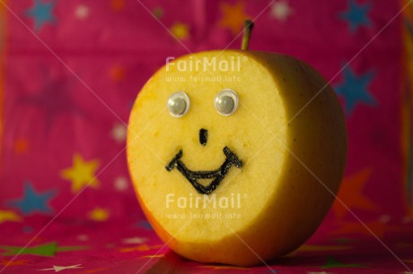 Fair Trade Photo Apple, Closeup, Colour image, Food and alimentation, Fruits, Funny, Horizontal, Peru, Smile, South America, Studio