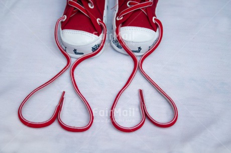 Fair Trade Photo Birth, Closeup, Colour image, Heart, Horizontal, Indoor, New baby, Peru, Red, Shoe, South America, Studio