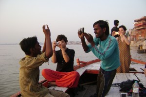 Taking pictures together during a boat ride along the Ganges