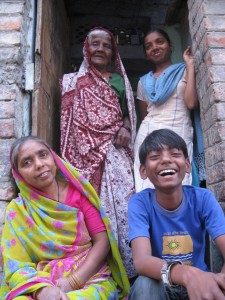 Kaushal with his family in front of his house Kaushal with his family in front of his house
